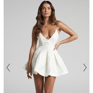 GEMIMA STRAPPY PLUNGE NECK FIT AND FLARE MINI DRESS